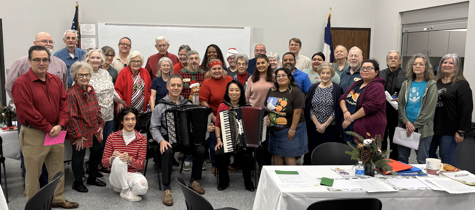 A photo of Friends members with bayan and accordion players Stas Venglevski and Megumi Hada