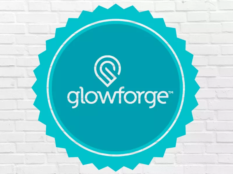 Glowforge logo on teal with brick wall background